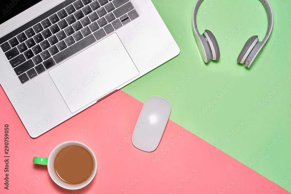 Poster blank notebook page on pastel colored background office desk with different objects