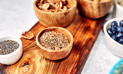 bowl with flax seeds, on a kitchen cutting board, diet, vitamins, healthy lifestyle