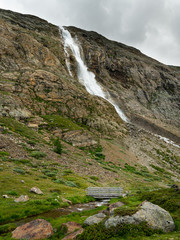 Waterfall in Martell valley in South Tyrol on a sunny day in summer