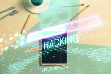 Double exposure of hacking theme drawing on digital tablet, table background. Concept of data...