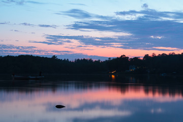 Fototapeta premium Reflection sunset over the lake