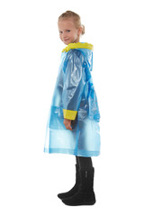 Full shot of a little blonde girl dressed in a blue nacre raincoat, black jeans and black high shammy boots. The raincoat with a print on the back side has a back section for a school bag fitted