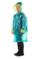 Full shot of a little blonde girl dressed in a green nacre raincoat, black jeans, black top and black high shammy boots. The raincoat with pockets is buttoned with press-studs, 