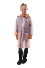 Full shot of a little blonde girl dressed in a pink nacre raincoat, black jeans, black top and black high shammy boots. The raincoat with pockets is buttoned with press-studs, 