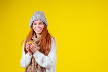 sick illness redhaired ginger woman good looking wearing knitted sweater and hat with scarf...