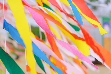 Texture of colourful yellow orange blue pink color ribbon decorated . Abstract  pattern background.