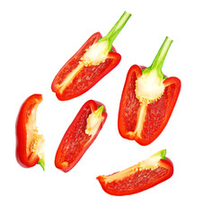 Set of fresh sliced  red bell pepper isolated on white background. Top view