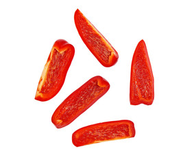 Cut slices of red sweet bell pepper isolated on white background, top view.Clipping Path.