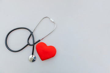 Simply minimal design with medicine equipment stethoscope or phonendoscope and red heart isolated...
