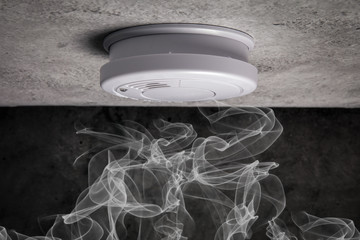 Close up smoke detector on a ceiling. Smoke, fire alarm