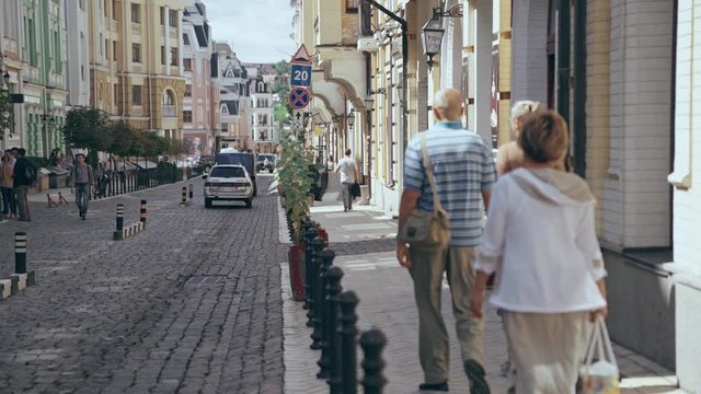 people walking at street at daytime 