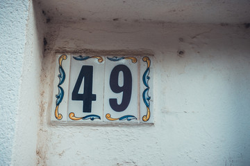 number 49 door sign in beautiful colors