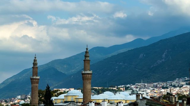 Bursa Ulu Cami Mosque minaret and Uludag Mountain view. Time lapse video