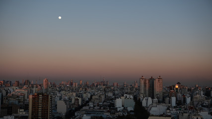 The moon and the city