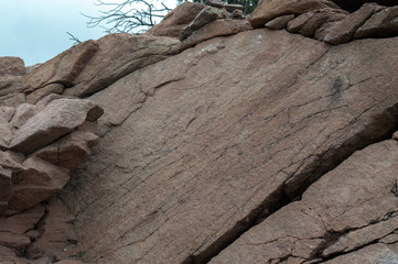 The eye is drawn to the large flat rock area of this Colorado mountain. Bokeh.
