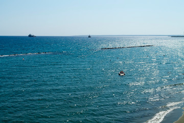 Panorama of blue sea in sunlight