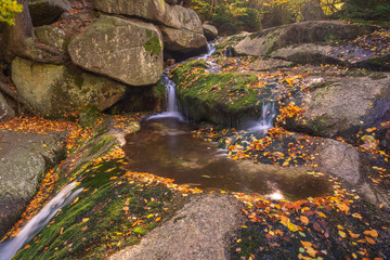 Waterfall Kaskady Myi in autumn in Sudety mountains, Przesieka, Poland