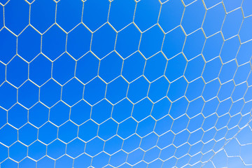 Abstract soccer goal net pattern.