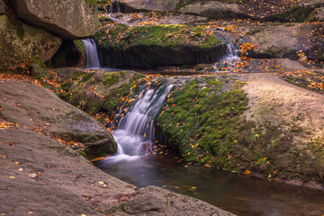 Waterfall Kaskady Myi in autumn in Sudety mountains, Przesieka, Poland