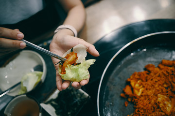Eating kimchi and iceberg lettuce, Korean style