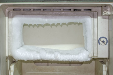 Ice in the freezer of the old refrigerator.