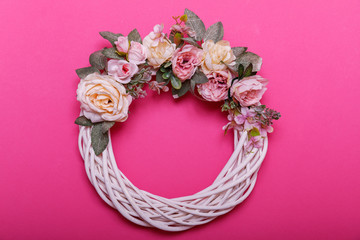 Wreaths with autumn leaves decorative Halloween on pastel color background, with copy space for text. Flat lay.