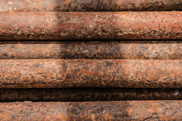 rusty metal background. rusty metal pipes closeup.