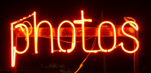 Neon inscription "photos". Cyberpunk neon minimal concept