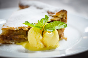 home made apple strudel  with vanilla ice cream