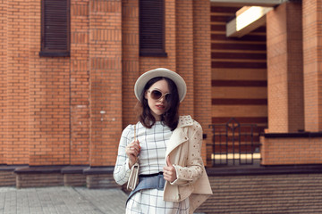 Stylish young girl in an autumn look