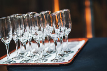 Empty champagne glasses ready for a catering service