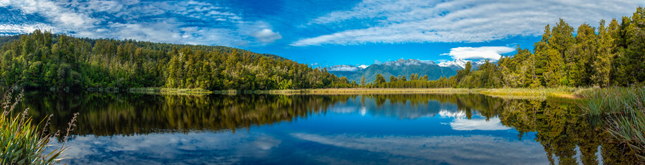Obraz na płótnie Canvas Lake Matheson￨Fox Glacier￨Aoraki/Mount Cook & Mount Tasman￨Te Wahipounamu￨The Place of Green Stone￨World Heritage in South West New Zealand