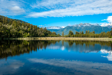 Naklejka na ściany i meble Lake Matheson￨Fox Glacier￨Aoraki/Mount Cook & Mount Tasman￨Te Wahipounamu￨The Place of Green Stone￨World Heritage in South West New Zealand