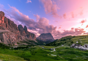 A stunning sunset view of the Dolomites Alps with beautiful sunset sky. (View from a top place for...