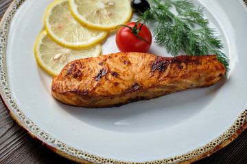 Grilled salmon steak with side dish . catering menu