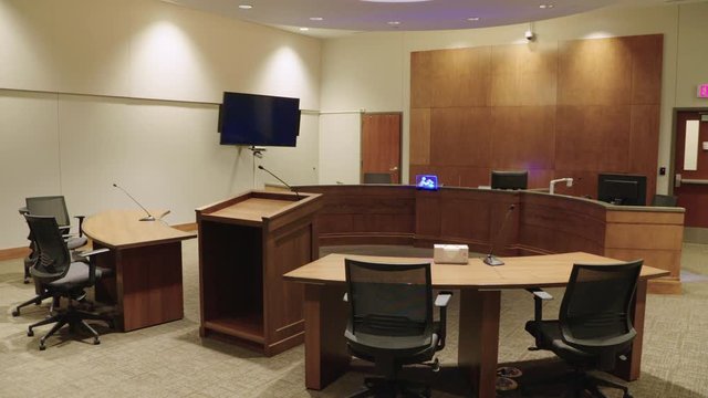 Empty Courtroom In Rural Courthouse, Small Court With Judge Bench And TV For Remote Video Conferencing. Prores File, Shot In 4K.