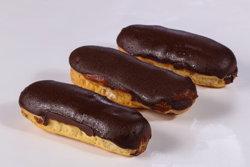 Tasty eclair with cream