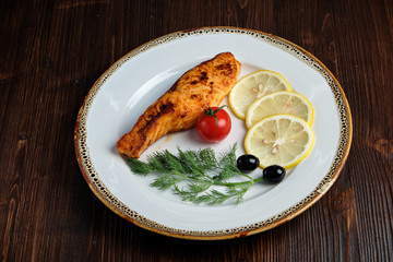 Grilled salmon steak with side dish . catering menu