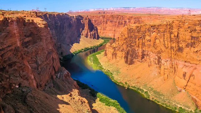 Beginning of the Grand Canyon at Lake Powell. Lake Powell is a reservoir on the Colorado River, straddling the border between Utah and Arizona. United States of America. Cinemagraph loop background.