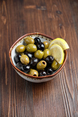 Olives and olives with lemon. menu for catering