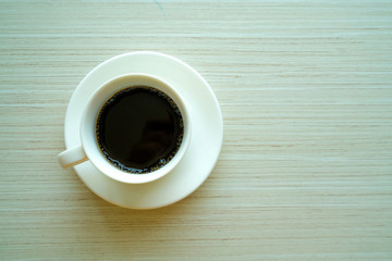  cups of coffee on wooden table background