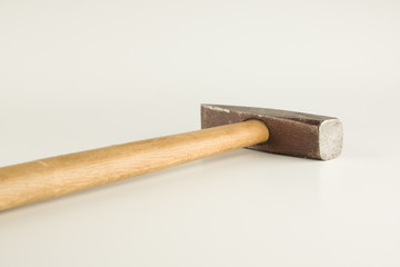 hammer with wooden handle isolated on a white background