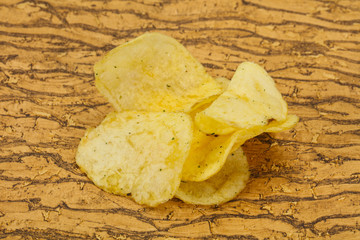 Natural potato salted chips heap