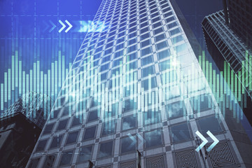 Forex chart on cityscape with tall buildings background multi exposure. Financial research concept.