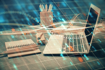 Financial graph colorful drawing and table with computer on background. Double exposure. Concept of international markets.