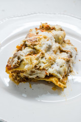 Lasagna with Minced Meat Beef and Bechamel Sauce in Plate. / Classic Italian Dish.
