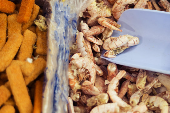 Shrimps And Fish Fingers At A Grocery Store