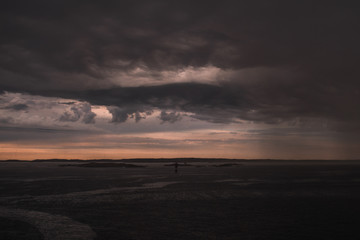 Stormy clouds by the ocean