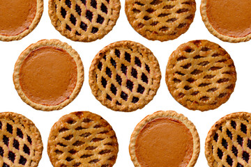 Overhead still life of fresh baked holiday pies on white © Steve Cukrov