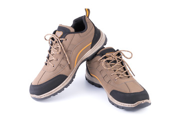 pair brown sneakers isolated on white background